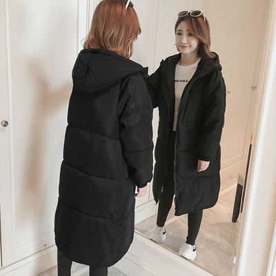 Μακρύ χειμωνιάτικο μαύρο γυναικείο μπουφάν με κουκούλα