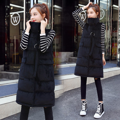 Γυναικείο μακρύ γιλέκο με ψηλή γιακά με τσέπες και μεταλλικό στοιχείο με  κορδόνια