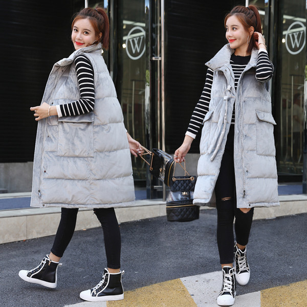 Γυναικείο μακρύ γιλέκο με ψηλή γιακά με τσέπες και μεταλλικό στοιχείο με  κορδόνια