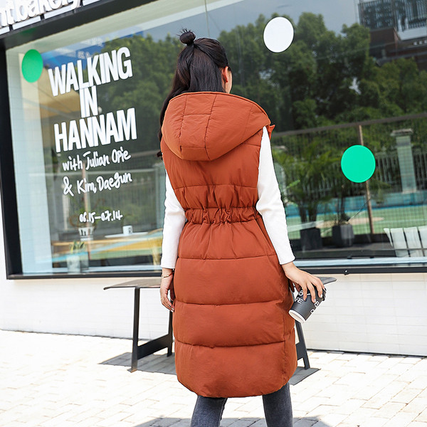 Γυναικείο μοντέρνο γιλέκο με  ζώνη