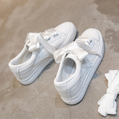 Γυναικεία πάνινα παπούτσια σε ένα πολύχρωμο οτίβο