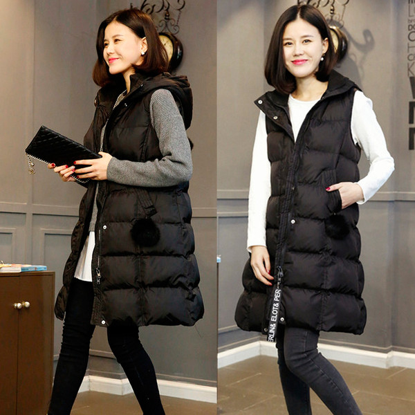 Μακρύ γυναικείο μπουφάν με κουκούλα και κατωφέρεια σε μαύρο χρώμα