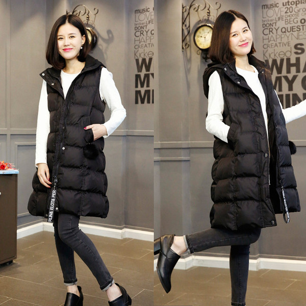 Μακρύ γυναικείο μπουφάν με κουκούλα και κατωφέρεια σε μαύρο χρώμα