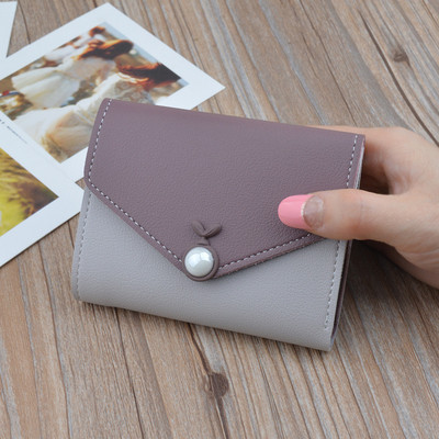 Μικρό μοντέρνο γυναικείο πορτοφόλι σε διάφορα χρώματα