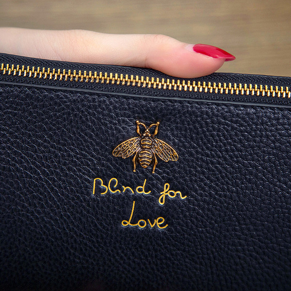 Portofel de dama in mai multe culori cu decor metalic