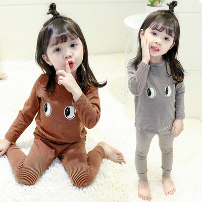 Children`s pajamas in two colors with embroidery