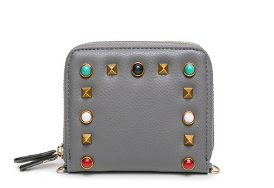 Γυναικείο μικρό πορτοφόλι με μεταλλική διακόσμηση σε διάφορα χρώματα
