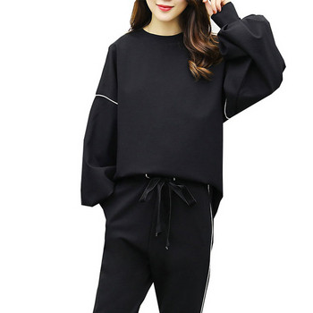 Спортен дамски комплект в черен цвят от две части - суичър с широки ръкави и анцунг с еластична талия