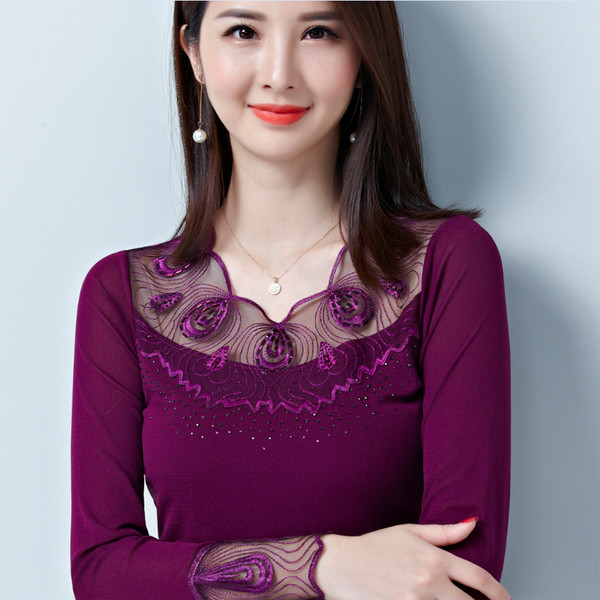 Модерна дамска блуза с прозрачни елементи в черен и лилав цвят