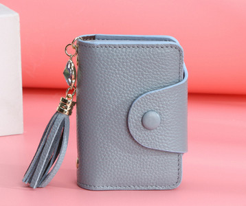 Γυναικείο χαρτοφυλάκιο εγγράφων σε διάφορα χρώματα με φούντα