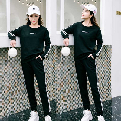 Γυναικεία αθλητικά σύνολα με δύο μέρη σε μαύρο και άσπρο χρώμα