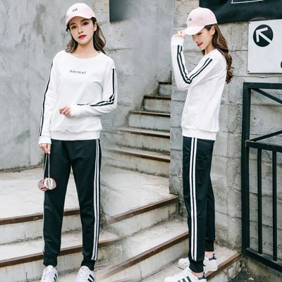 Γυναικεία αθλητικά σύνολα με δύο μέρη σε μαύρο και άσπρο χρώμα