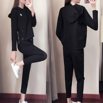 НОВ модел спортен дамски комплет включващ блуза и панталон - черен и бял цвят