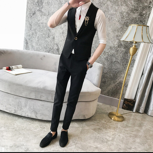 Κομψό μακρύ ανδρικό γιλέκο με διακοσμητικές τσέπες