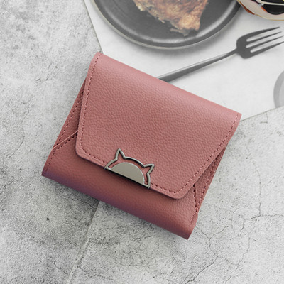 Γυναικείο πορτοφόλι σε διάφορα χρώματα με μεταλλική διακόσμηση