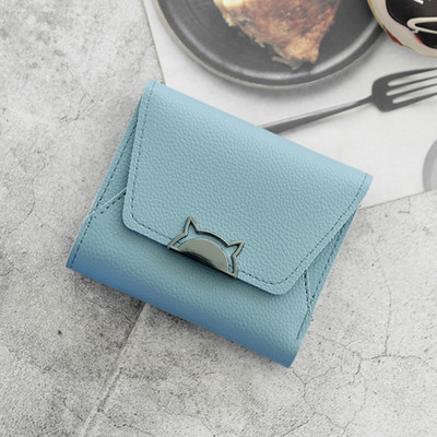 Γυναικείο πορτοφόλι σε διάφορα χρώματα με μεταλλική διακόσμηση