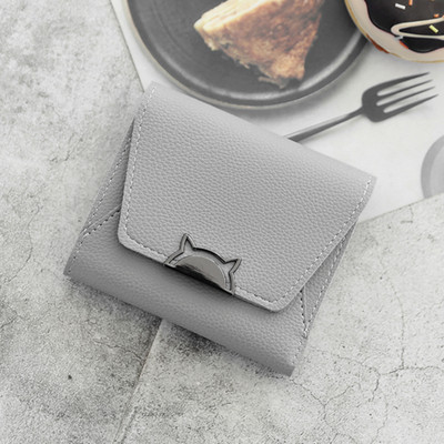 Γυναικείο πορτοφόλι σε διάφορα χρώματα με μεταλλική διακόσμηση