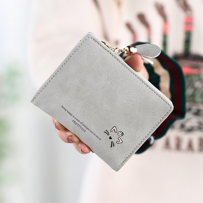 Γυναικείο πορτοφόλι σε διάφορα χρώματα με επιγραφές