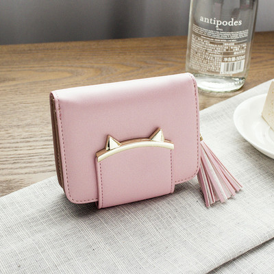 Γυναικείο πορτοφόλι σε διάφορα χρώματα με φούντα