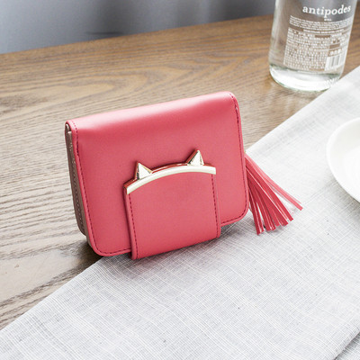 Γυναικείο πορτοφόλι σε διάφορα χρώματα με φούντα