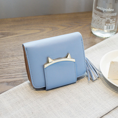 Γυναικείο πορτοφόλι σε διάφορα χρώματα με φούντα