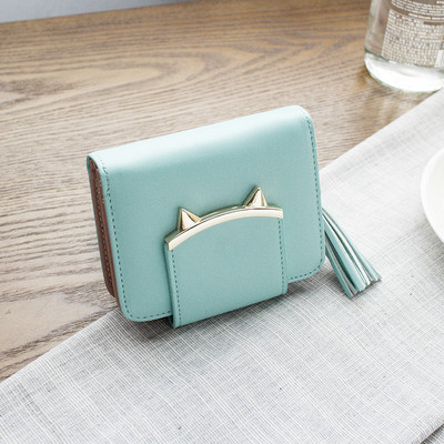 Γυναικείο πορτοφόλι σε διάφορα χρώματα με φούντα