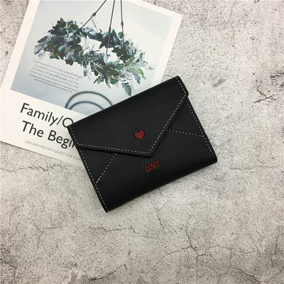 Γυναικείο πορτοφόλι σε διάφορα χρώματα με επιγραφή