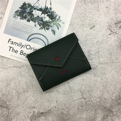 Γυναικείο πορτοφόλι σε διάφορα χρώματα με επιγραφή