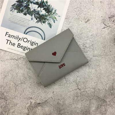 Γυναικείο πορτοφόλι σε διάφορα χρώματα με επιγραφή