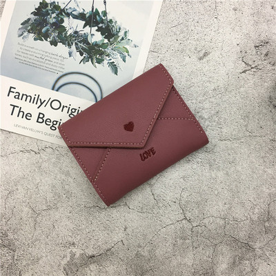 Γυναικείο πορτοφόλι σε διάφορα χρώματα με επιγραφή