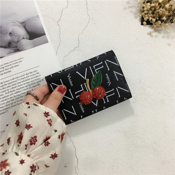 Γυναικείο  μοντέρνο πορτοφόλι με τρισδιάστατο στοιχείο σε τρία χρώματα