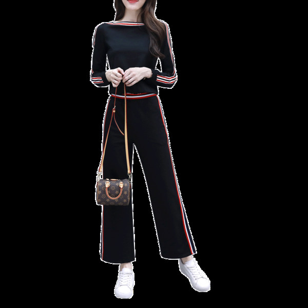 Μοντέρνο γυναικείο αθλητικό σετ με χρωματιστές άκρες και σχισμές σε λευκό και μαύρο χρώμα