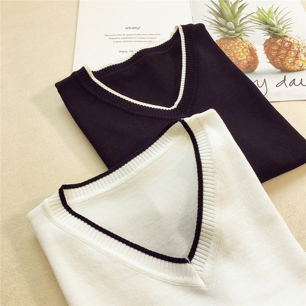 Bluză de damă modernă cu decolteu în V și mâneci largi în alb și negru