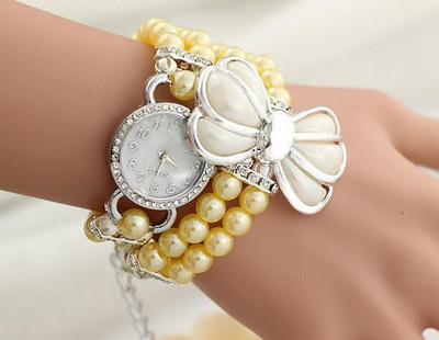 Γυναικείο ρολόι δύο χρωμάτων με διακοσμητικά μαργαριτάρια και κορδέλα
