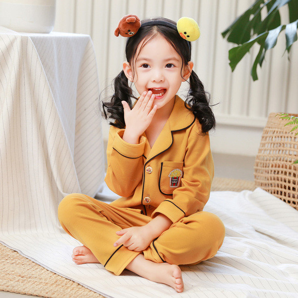 Children`s pajamas with buttons for girls in three colors