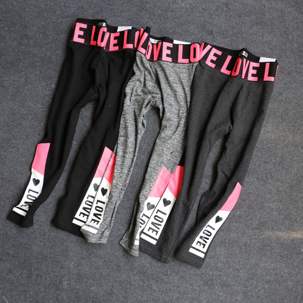 Jambiere sport de damă cu inscripții colorate în două culori