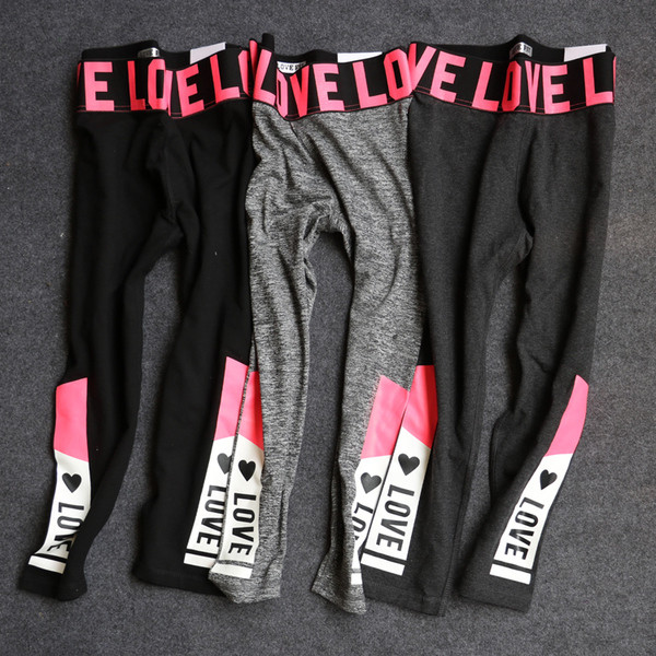 Jambiere sport de damă cu inscripții colorate în două culori