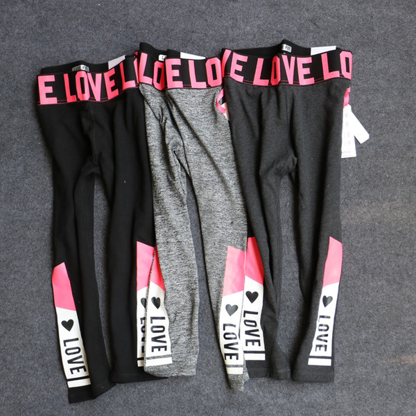 Jambiere sport de damă cu inscripții colorate în două culori