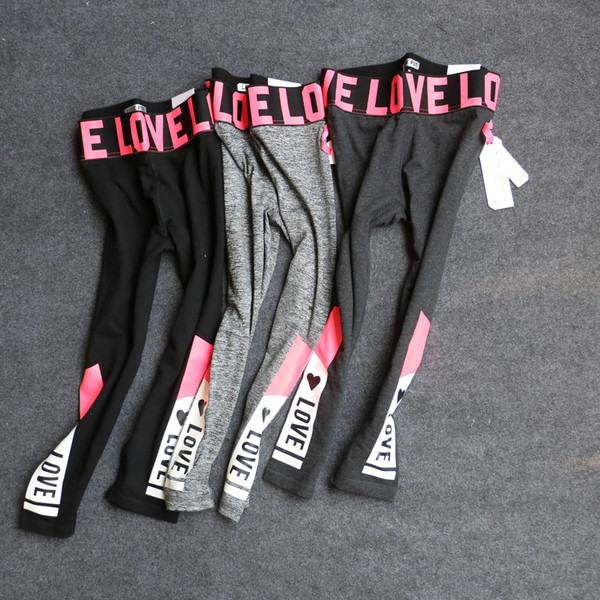 Jambiere sport de damă cu inscripții colorate în două culori