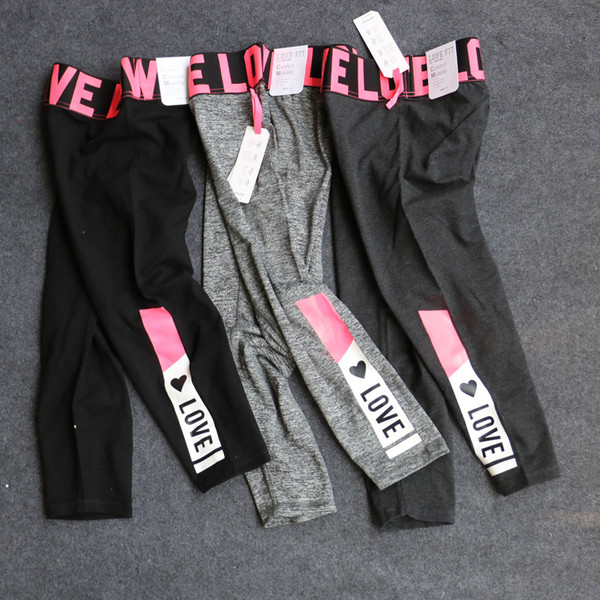 Jambiere sport de damă cu inscripții colorate în două culori