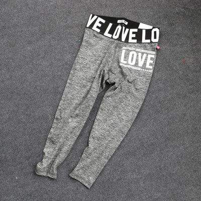 Γυναικείο  αθλητικό κολάν  με πολύχρωμες επιγραφές σε διάφορα χρώματα