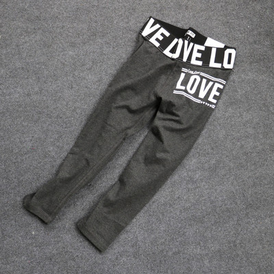 Γυναικείο  αθλητικό κολάν  με πολύχρωμες επιγραφές σε διάφορα χρώματα