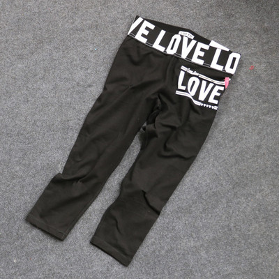 Γυναικείο  αθλητικό κολάν  με πολύχρωμες επιγραφές σε διάφορα χρώματα