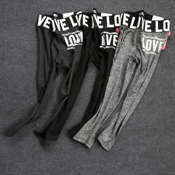 Γυναικείο  αθλητικό κολάν  με πολύχρωμες επιγραφές σε διάφορα χρώματα