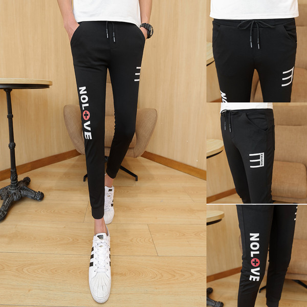 Pantaloni pentru bărbați de culoare neagră cu inscripție