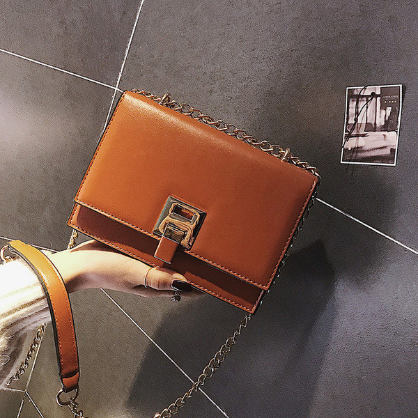 Geanta de dama eleganta cu maner metalic in mai multe culori