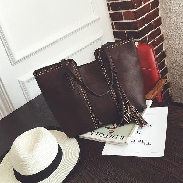 Geanta de dama cu accesoriu ciucuri in mai multe culori