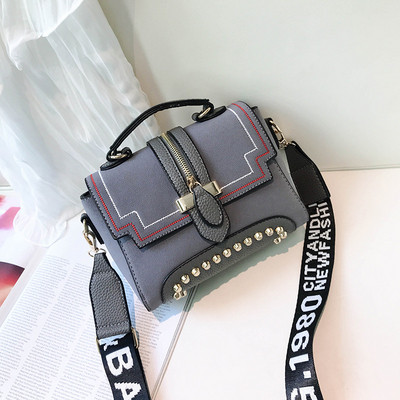 Geanta de dama cu elemente metalice in mai multe culori