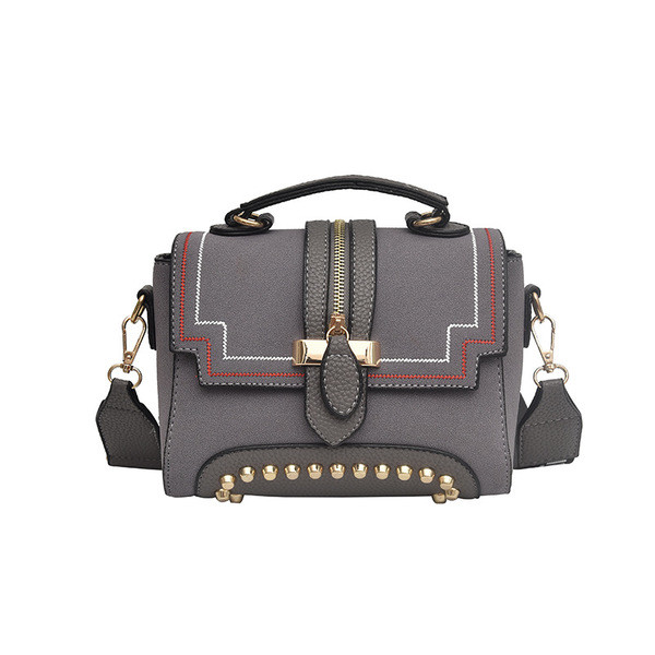 Geanta de dama cu elemente metalice in mai multe culori