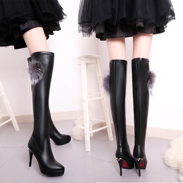 Μαύρες  γυναικείες μπότες  από οικολογικό δέρμα με  γούνα και λεπτό τακούνι